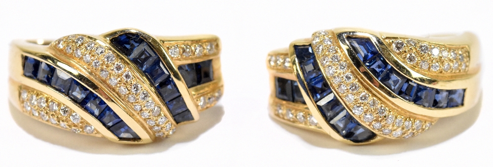 A pair of 14ct yellow gold sapphire and diamond half hoop earrings, set with forty-nine brilliant