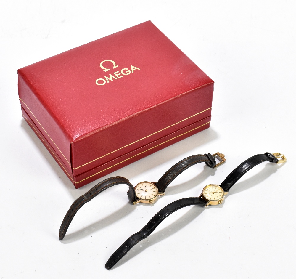 OMEGA; a lady's 9ct gold wristwatch, the circular dial with baton numerals, with a leather strap,