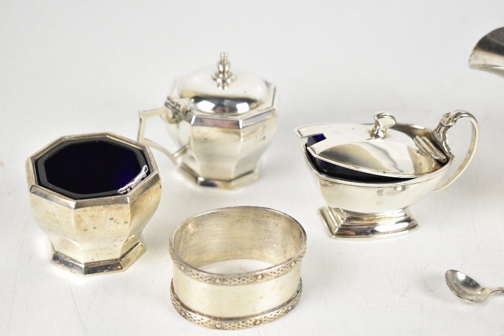 A hallmarked silver four piece cruet, Birmingham 1960, a Hugh Wallis Arts & Crafts silver napkin - Image 3 of 4