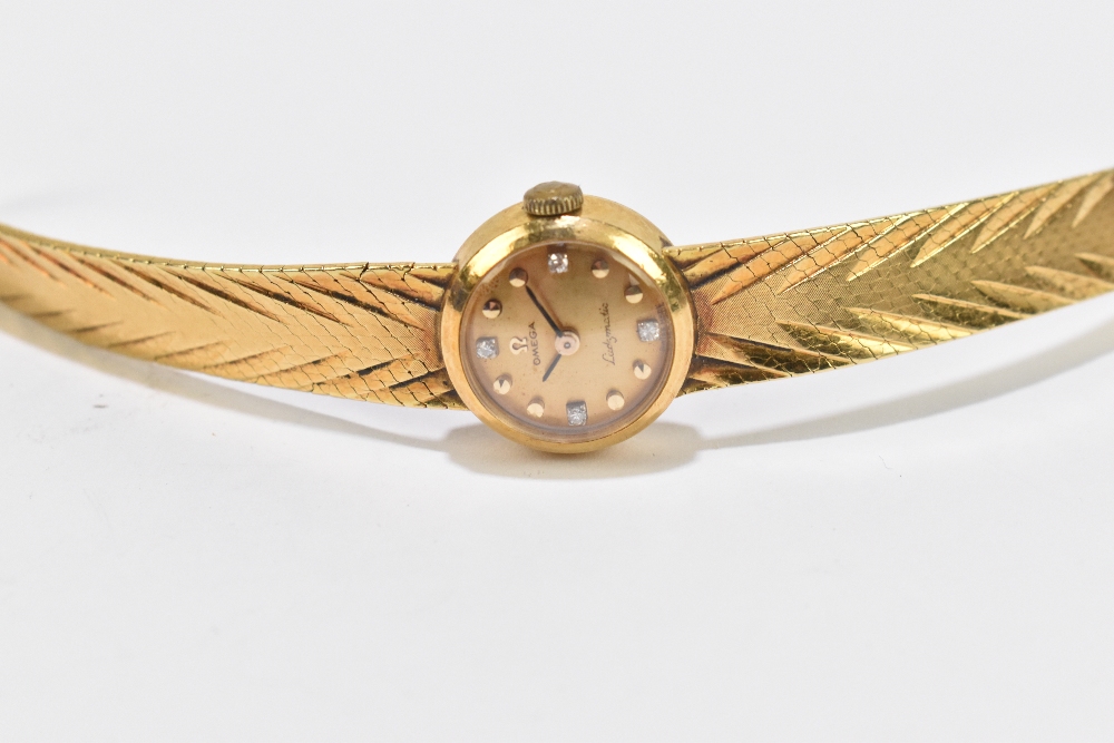 OMEGA; a lady's 18ct yellow gold 'Ladymatic' wristwatch with four small diamonds set to hour marks - Image 2 of 3