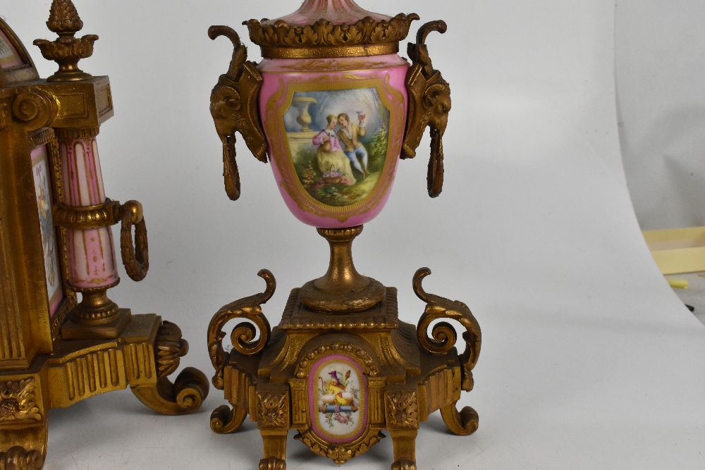 A 19th century French three piece gilt metal clock garniture, with pink and hand painted porcelain - Image 3 of 5