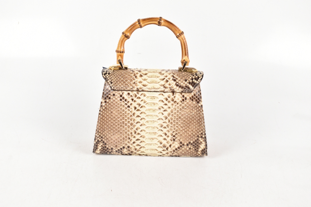 VERO PITONE; a genuine python skin structure leather handbag with a front bamboo and gold tone - Image 3 of 5