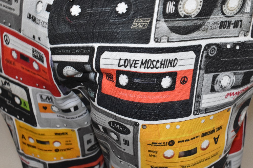 LOVE MOSCHINO; a pair of multi-coloured 100% cotton 'Cassette Tape' print jogging bottoms with two - Image 4 of 5