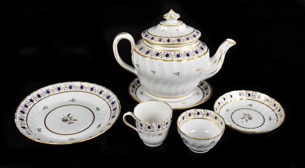 NEW HALL; an 18th century porcelain teapot of oval form with panel decoration, pattern number 202,