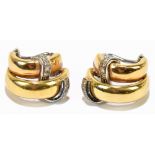 BRIGID O'HAGAN; a pair of 18ct yellow gold, white gold mounted and diamond set half hoop earrings,