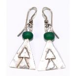 GUY ROYLE; a pair of white metal and green bead triangular form drop earrings, length of drop