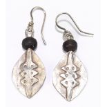 GUY ROYLE; a pair of white metal and bead drop earrings of shield form, length of drop approx. 40mm,