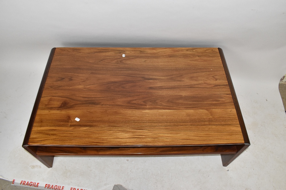 MANNER OF JENSEN FROKJAERAS; a 1970's Danish rosewood coffee table, with curved edges, height - Image 2 of 4