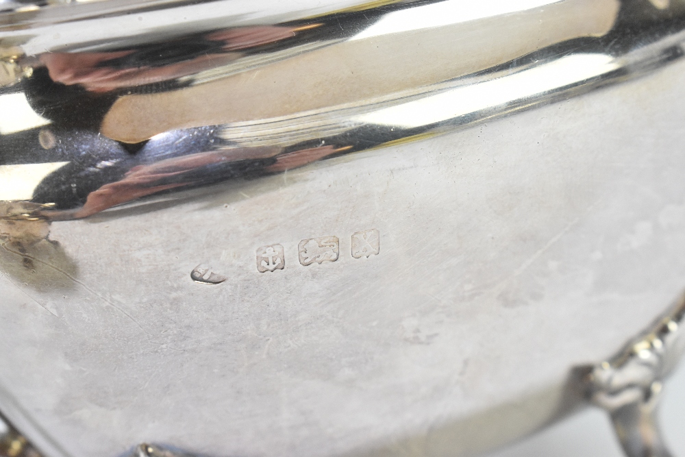 ADIE BROS; a George VI hallmarked silver three piece tea service of shaped oval form, on four - Image 3 of 6