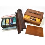 Two vintage Mah-jong sets, one in cardboard box with painted wooden tiles, the other in wooden box