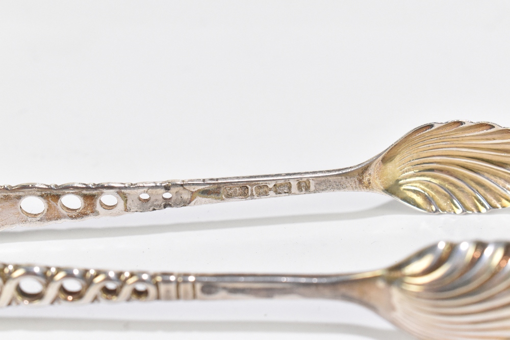 AITKEN BROS; a set of eleven Victorian hallmarked silver teaspoons with shell shaped bowls, and - Image 3 of 3