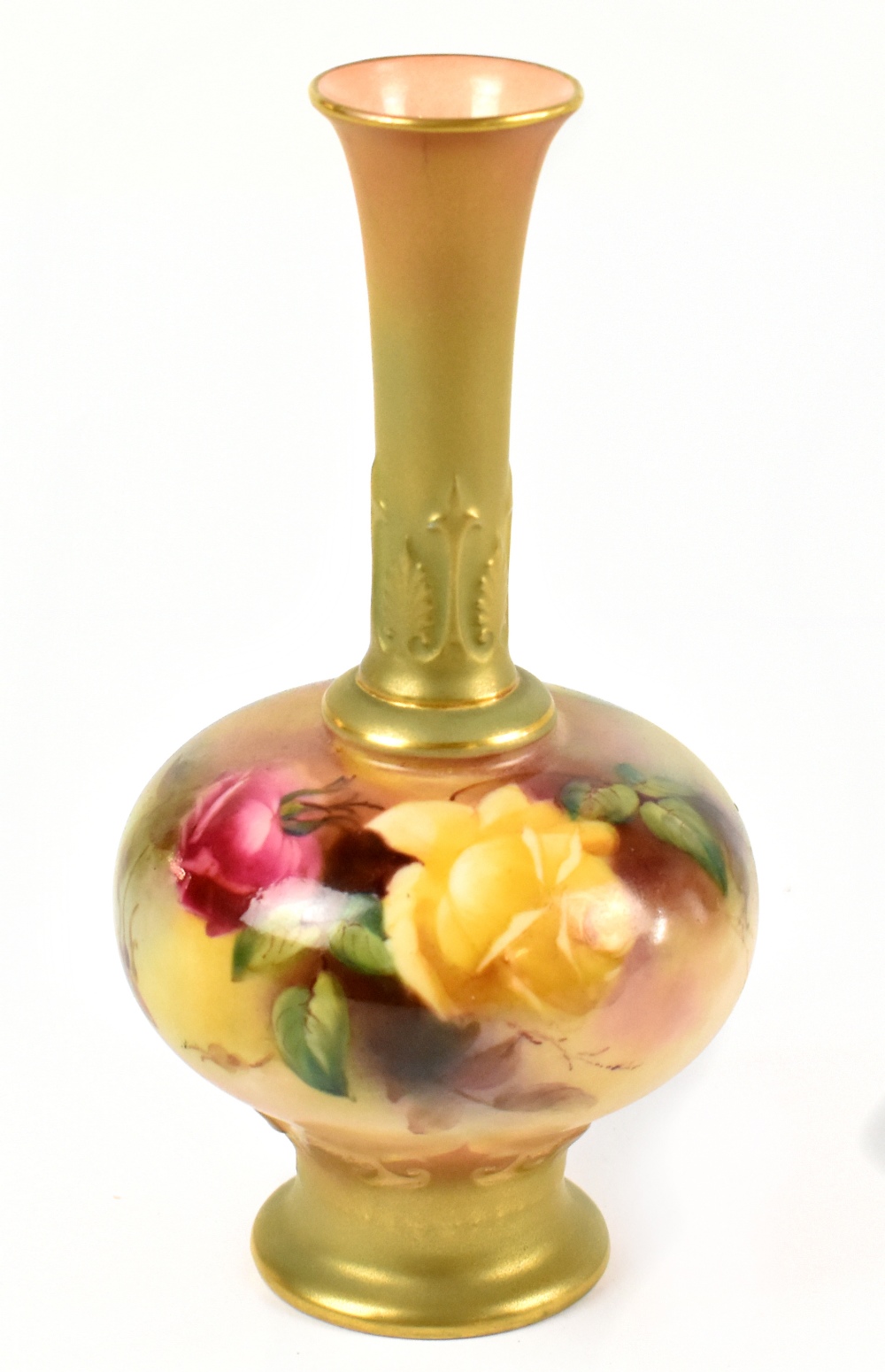 ROYAL WORCESTER; a hand painted vase of squat form with elongated neck decorated with roses, green