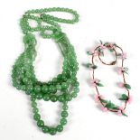 A 1930s vintage green glass bead graduated necklace with five strands, approx. 84cm, and a 1930s