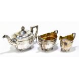 MATTHEW CRAW (probably); a George III hallmarked silver three piece tea service, the teapot cover