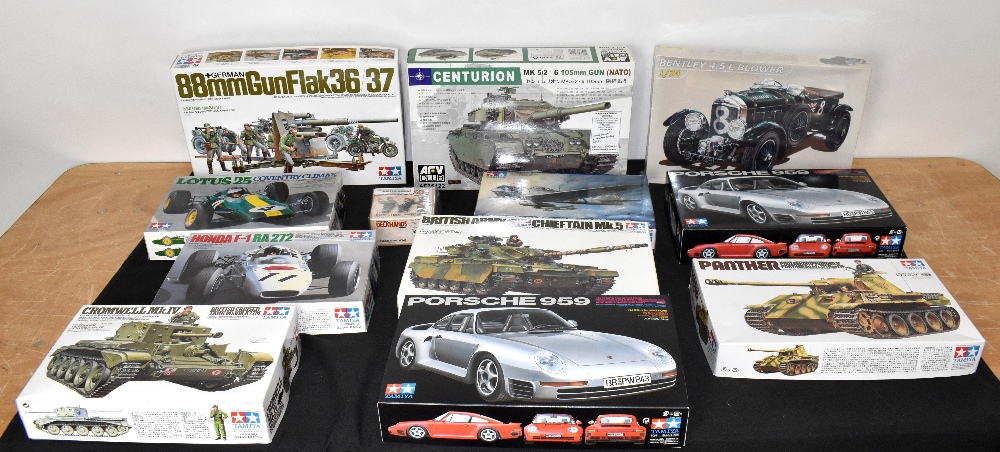 TAMIYA; a large collection of boxed model kits including Lotus 25, Mitsubishi A6M20 Fighter, Porsche