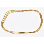 An 18ct yellow gold three strand textured necklace, length 45.5cm, approx. 48.3g. Additional