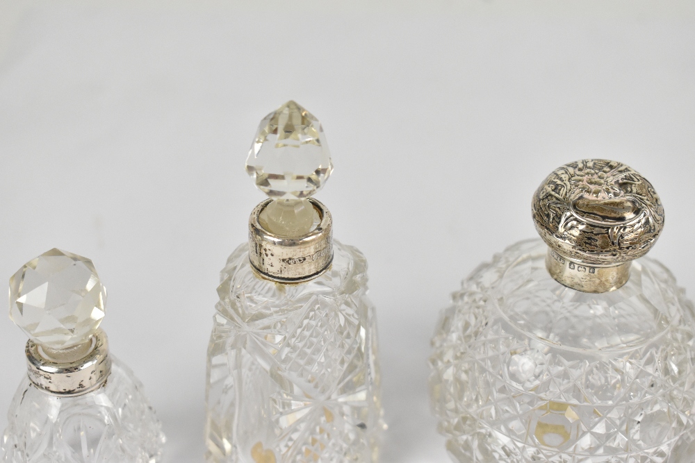 Six cut glass dressing table and perfume bottles, each with hallmarked silver collars or rims, - Image 2 of 3