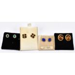 Four pairs of 9ct yellow gold framed earrings including lapis lazuli, baltic amber and emerald,