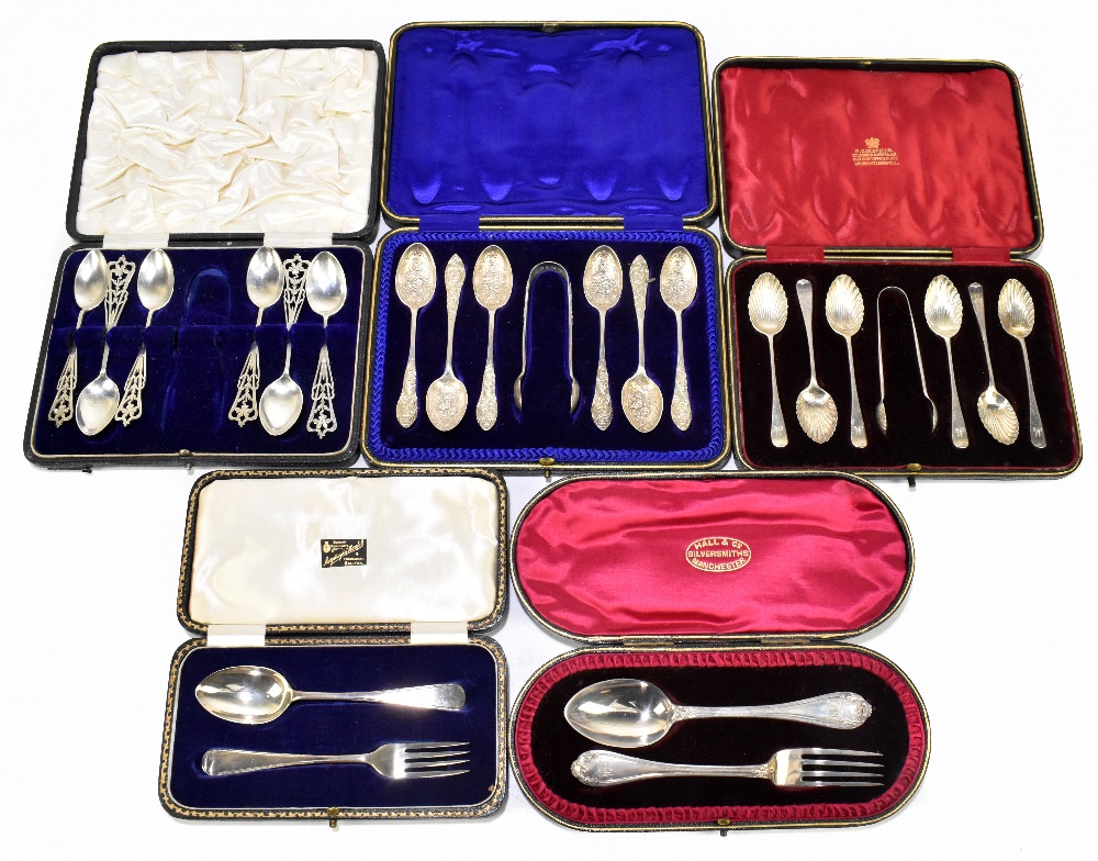 A set of six late Victorian hallmarked silver tea spoons and matching sugar tongs, with floral