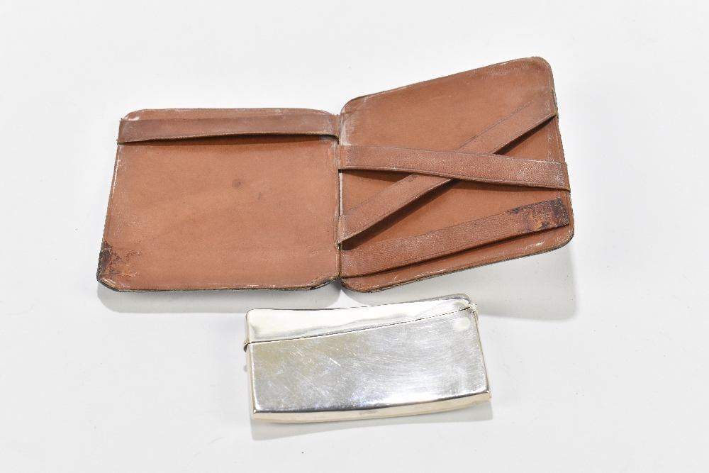 HENRY WILLIAMSON LTD; a George V hallmarked silver wallet of shaped rectangular form, with chased - Image 3 of 3