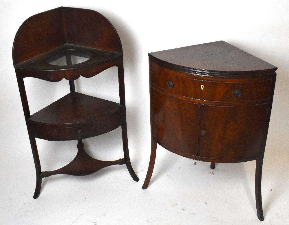 A George III mahogany corner washstand with three inserts to the top above a single drawer on