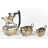 VINERS; a hallmarked silver three piece coffee service, the coffee pot with ebonised finial and