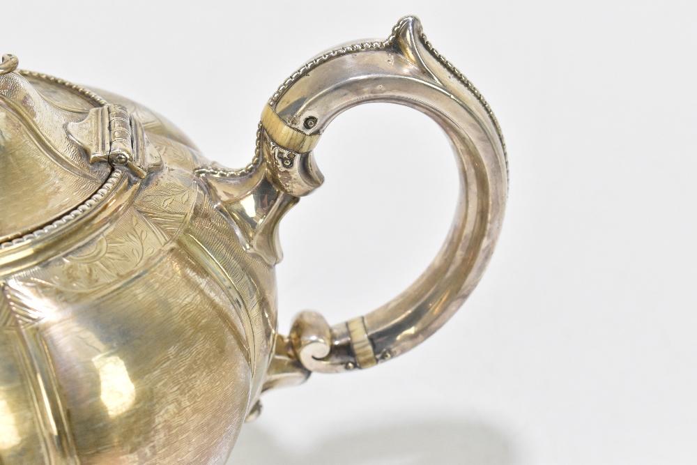 MARTIN, HALL & CO; a Victorian silver three piece tea service, the teapot with fruit and leaf - Image 5 of 7