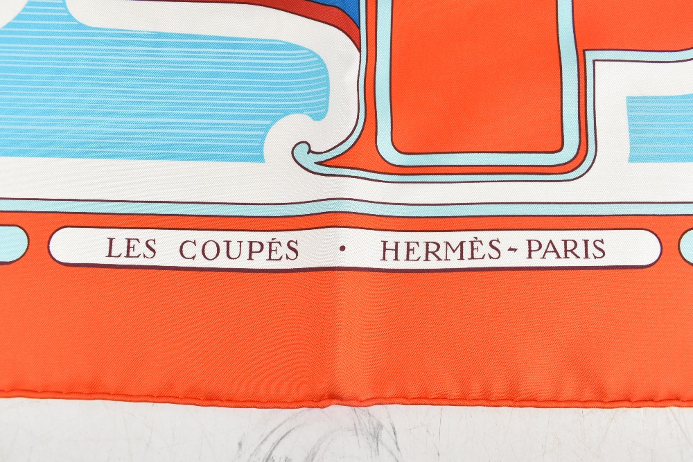 HERMES; a 100% silk orange, blue and red Les Coupes scarf by Francoise de la Perriere, unused and - Image 2 of 3