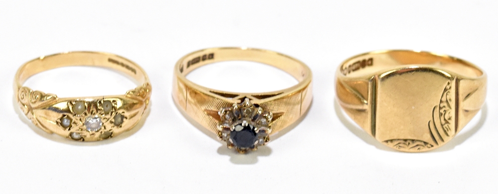 Three 9ct yellow gold rings, comprising a signet ring, size U, approx 4.1g, a sapphire ring, size P,