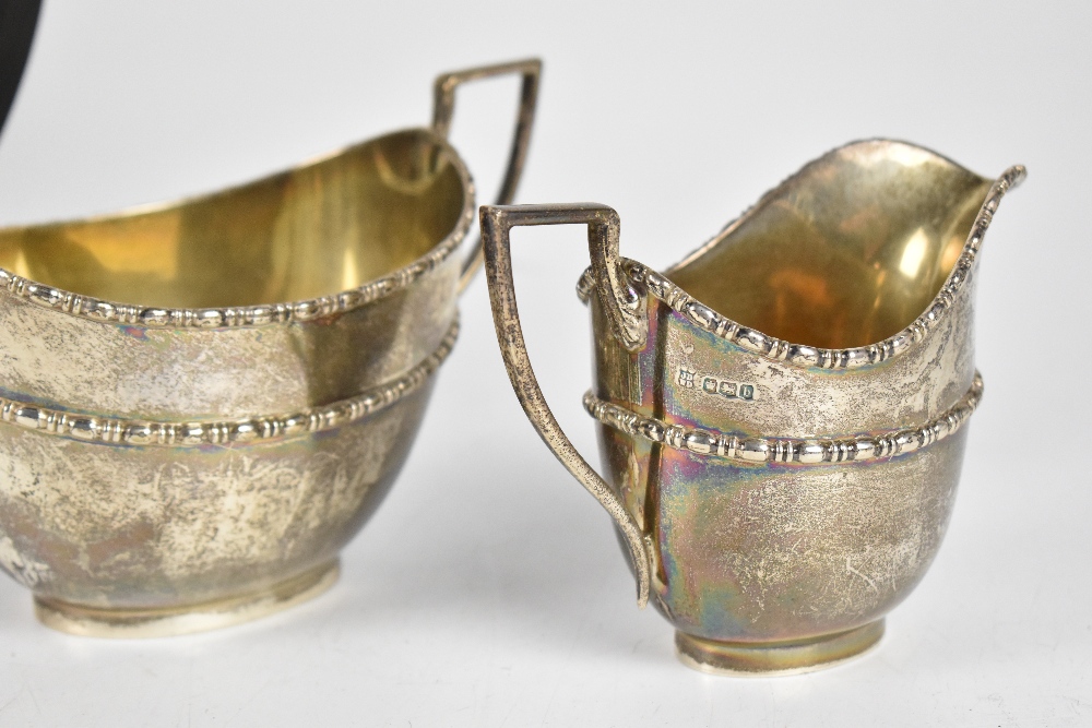 JAMES DEAKIN & SONS; a George V hallmarked silver four piece tea service, Sheffield 1918, height - Image 4 of 4