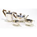 SPIERS & WORDSWORTH; an Art Deco four piece hallmarked silver tea service, with bakelite handles and