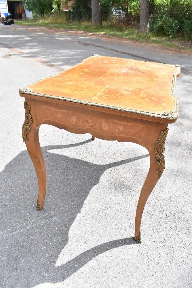 An early 20th century French inlaid kingwood inverted breakfront writing table with gilt metal - Image 3 of 4