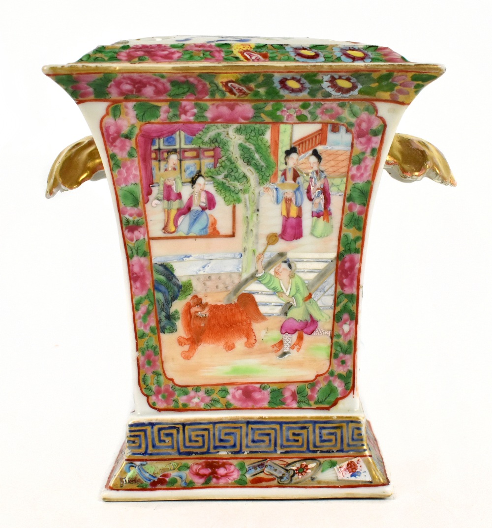 A 19th century Chinese Famille Rose bough pot and cover painted in enamels with figures in temple