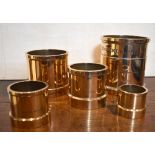 A graduated set of five early 19th century Imperial polished bronze measures, each by Bate of