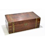 A Victorian figured walnut and brass mounted writing slope, with hinged lid enclosing a fitted