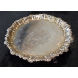 ROBERT REW; a George III hallmarked silver waiter with shell decorated raised border, central