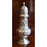NATHAN & HAYES; an Edwardian hallmarked silver sugar caster of baluster form, with embossed