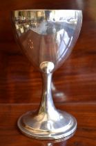 DANIEL EGAN; a George III Irish hallmarked silver goblet of plain form, with gilded detail to the