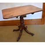 A late George III mahogany tripod occasional table, the rounded rectangular one piece top above ring