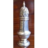 FRANCIS HIGGINS; a late Victorian hallmarked silver sugar caster raised on spreading circular