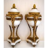 A pair of late 19th century French white marble and ormolu mounted cassolettes, each cover set