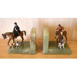 A pair of 1930s Austrian cold painted bronze and green onyx bookends, each modelled as hunt riders