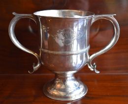 I. M.; a George III hallmarked silver twin handled cup with engraved initials 'WG' within a
