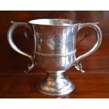 I. M.; a George III hallmarked silver twin handled cup with engraved initials 'WG' within a