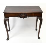 An early 20th century Irish mahogany console table, the moulded rectangular top above carved