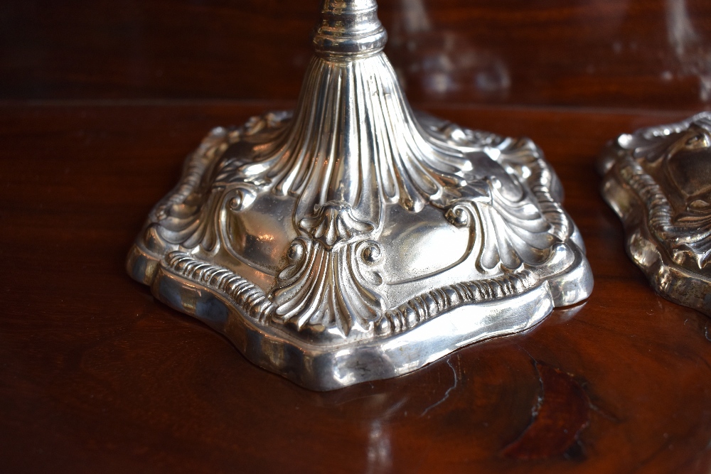 EBENEZER COKER; a pair of early George III hallmarked silver candlesticks, each with detachable - Image 2 of 4