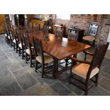 A monumental oak plank top refectory table formed of four enormous oak planks with cleated ends,