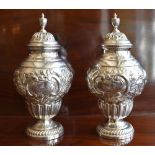 GEORGE MAUDSLEY JACKSON; a pair of late Victorian hallmarked silver sugar casters, each with band of