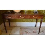 A Regency mahogany serving table in the manner of Gillows, the one piece rounded rectangular top