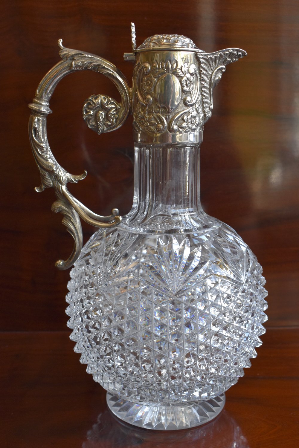 WILLIAM HUTTON & SONS LTD; a late Victorian hallmarked silver mounted and hobnail cut glass claret